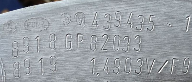 Round steel with inspection stamps